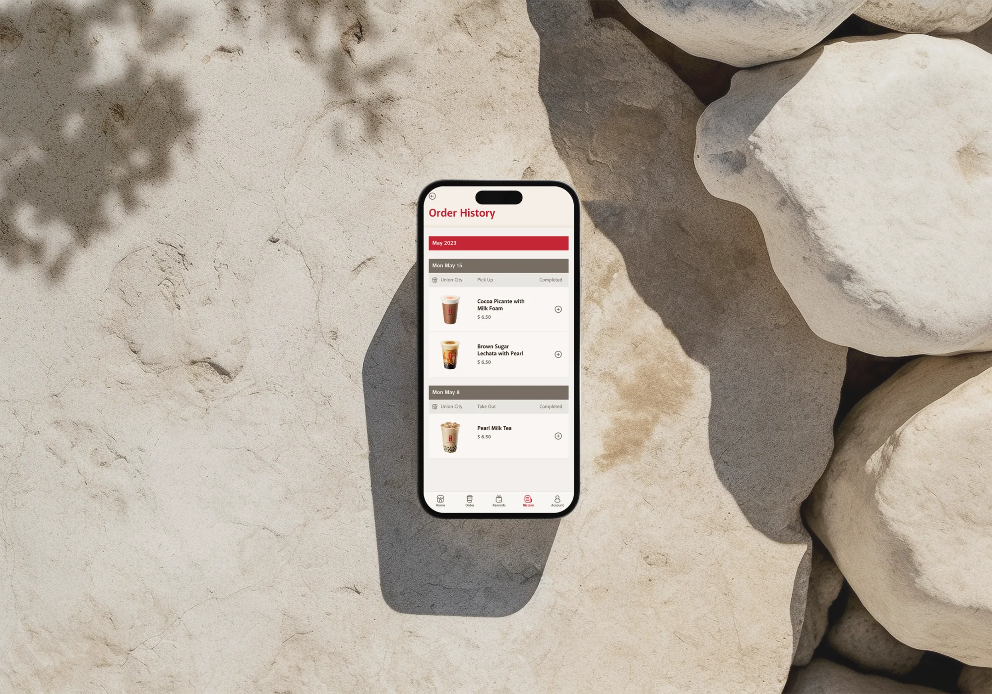 Order History screen: past orders listed by date, each with a quick-reorder shortcut