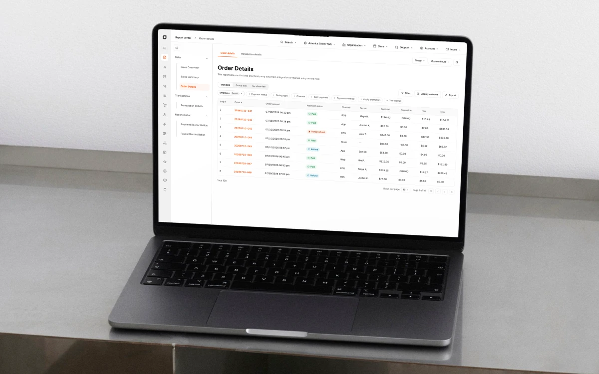 The Order Details report open on a laptop &mdash; a day of orders with payment status, channel, server and totals