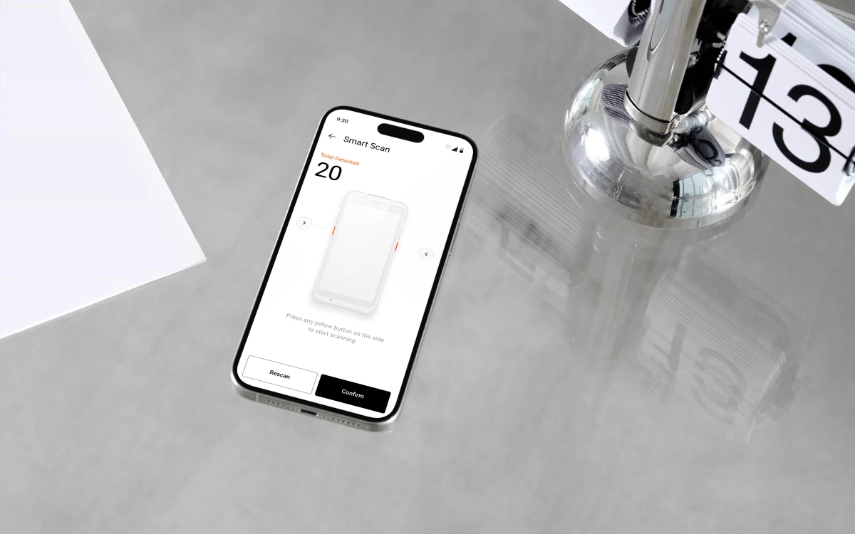 The handheld POS mid Smart Scan &mdash; twenty items detected, waiting on the side button to scan again