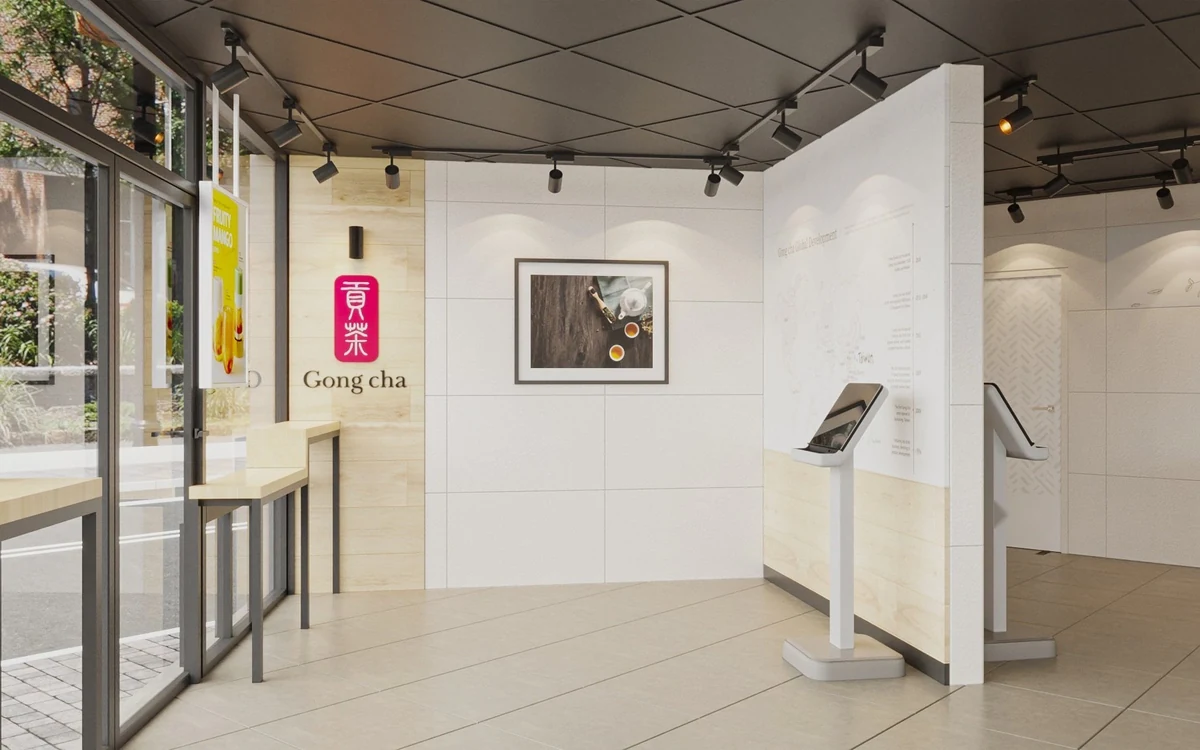 Wu Sian store interior &mdash; entrance signage, tea artwork and a self-order kiosk